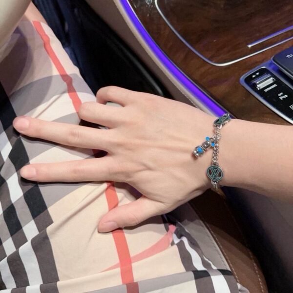 Louis Vuitton Round LV Link Bracelet with Blue Charm