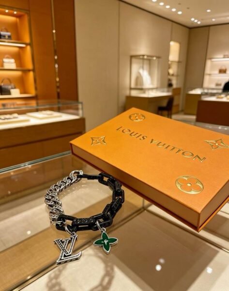Louis Vuitton Two Tone Link Bracelet with LV and Flower Charms